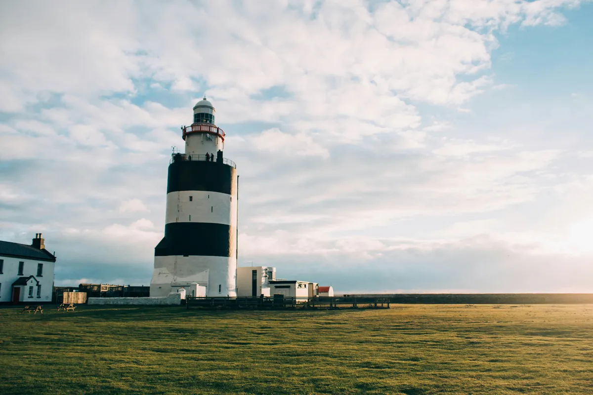 Hook Head Lighthouse at sunset, County Wexford, Ireland — one of the oldest operational lighthouses in the world.